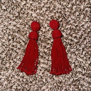 Red statement earrings